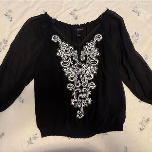 Elegant Black Woman's Blouse with White Embroidery